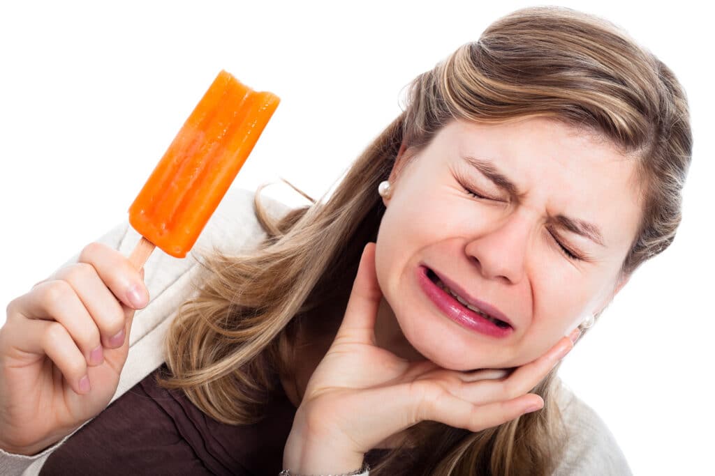woman suffering from teeth sensitivity